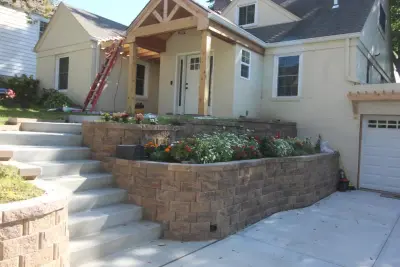 New Addition: Pergola, Retaining Wall, and Driveway — Home Renovation & Remodeling Services project by Schmidt Construction Omaha