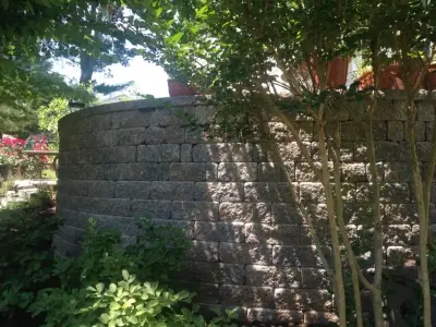 Updated Siding and 8-Foot Garden Retaining Wall — Home Renovation & Remodeling Services project by J. Neville Construction