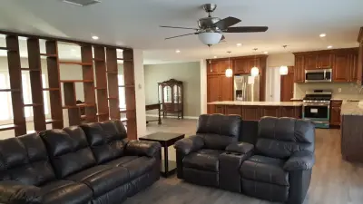 Revamped Open Interior Space, Patio Renovation, and New Garage Construction — Home Renovation & Remodeling Services project by Forma Contractors