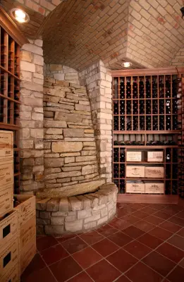 Northern Michigan Wine Cave with Water Feature — Home Renovation & Remodeling Services project by Padella Building Company, Inc.