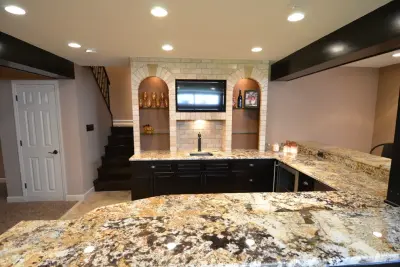 Walker basement renovation with wet bar — Kitchen Remodeling project by Remodeling And Painting Experts Inc.