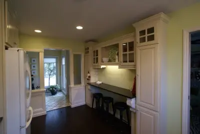 Elegant Cream Kitchen by Life-Style Design, LLC