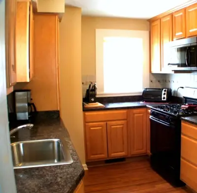Warm Modern — Kitchen Remodeling project by Andrea's Interior Design Gallery