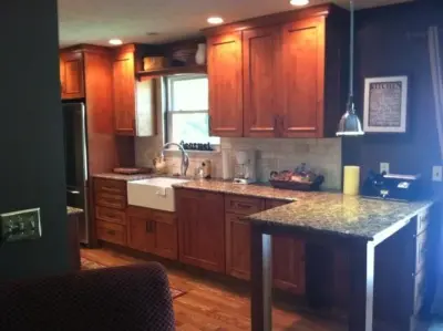 Newcastle Knotty Alder Hazelnut Medallion Cabinetry — Kitchen Remodeling project by The Kitchen Place