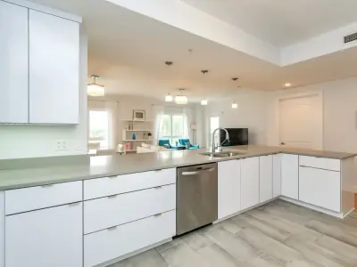 Mid-Century Modern Beach Condo — Kitchen Remodeling project by Woodsman Kitchens And Floors