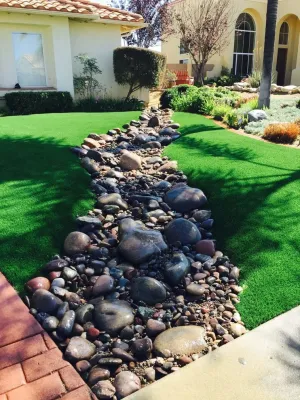 Alpine, CA Dry River Bed & Artificial Turf Installation — Landscape Construction project by Home Turf Synthetic Grass in Alpine