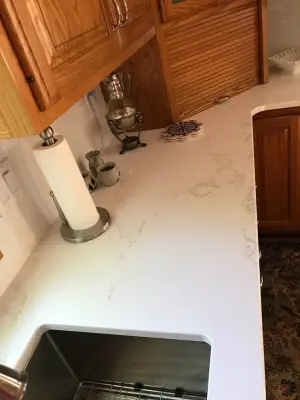 Hanstone Strato Countertops — Kitchen Remodeling project by Kitchen Design Gallery