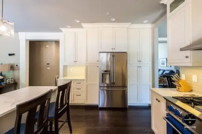 Lacquered Cream Kitchen and Family Room Makeover — Kitchen Remodeling project by Wiscomb Design, LLC.
