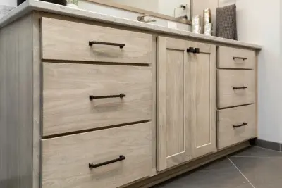 Bathroom Renovation Enhances Texture, Color, and Storage — Design-Build Services project by Red House Remodeling