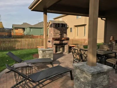 Paver patio with fire place — Landscape Construction project by Flash-N-Reds Inc in Omaha