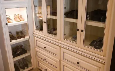 Personalized Walk-In Closet Cabinet Solutions — Design-Build Services project by McQueen Building Company
