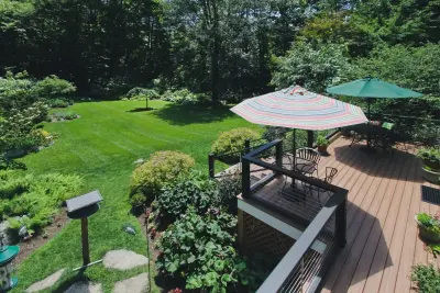 Custom Manchester Deck Featuring Stainless Steel Cable Railing — Design-Build Services project by WORKS By Jesse DeBenedictis, LLC