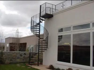 Orange County Exterior Iron Spiral Stairs — Design-Build Services project by Naddour's Custom Metalworks/Baltic Iron Doors
