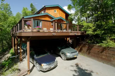 Linked Carport and Decks with Under Deck Roofing — Design-Build Services project by Treeline Construction