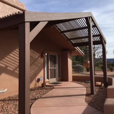 Front Entry Arbor and installation of Stone Mailbox — Landscape Construction project by Land Art Works, Inc.