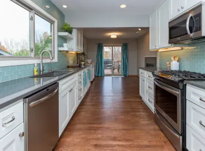 West Des Moines: Expanding Kitchen Spaces — Design-Build Services project by Red House Remodeling