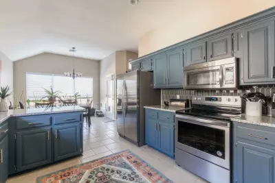 Blue Cabinet Kitchen — Design-Build Services project by Ten Key Home & Kitchen Remodels
