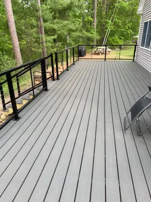 Decking with cable railing composite material — Carpentry & Woodworking project by Nightingale Carpentry And Painting LLC