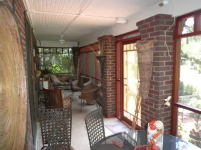 Mahogany Privacy Screen Porch in Mission Style — Carpentry & Woodworking project by Norwegian Wood