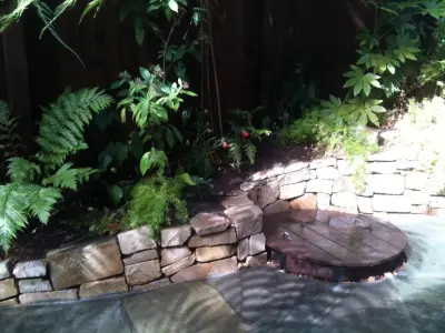 Outdoor Fireplaces by Gardens & Gables