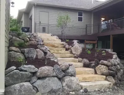 Native and Edible Plantings in a Terraced Walkout — Landscape Design project by Abundant Design, LLC