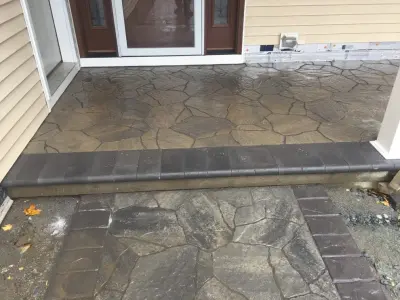 Paver Walkway and Concrete Paver Front Porch at the Entrance — Landscape Design project by Arborcare Landscape Services & Products, LLC.