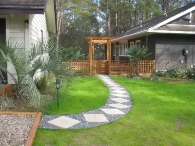Elegant rural path beneath an arbor — Landscape Design project by Rejuvenation LLC