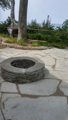 Custom Fire Pit and Natural Stone Patio — Landscape Design project by Twin Oaks Lawn And Landscape, Inc.