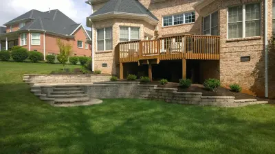Sloped Yard Outdoor Living — Landscape Design project by Carex Design Group