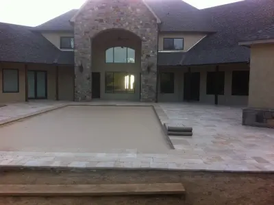 Stone Kitchen and Outdoor Living on a Travertine Patio — Landscape Design project by Everything Outdoors Of Tulsa