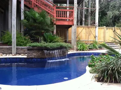 Emerald Island - Travertine Pool Deck — Landscape Design project by Yardworks, Inc.