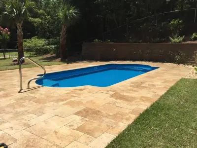 Retaining Wall and Landscaping for Travertine Pool Deck — Landscape Design project by Yardworks, Inc.