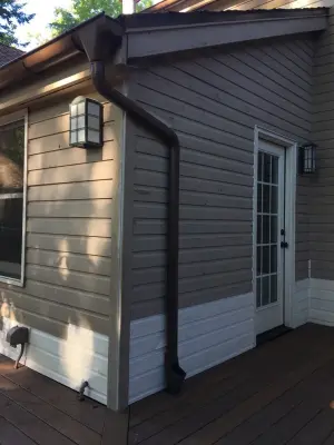 Aluminum Semi-Circular Gutters — Roofing & Gutter Services project by Royal Gutters, Inc.