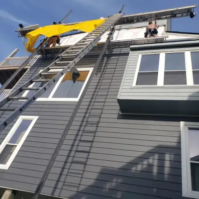 Vinyl Siding Installation by Celect in North Topsail Beach — Roofing & Gutter Services project by Atlantic Coastal Enterprises