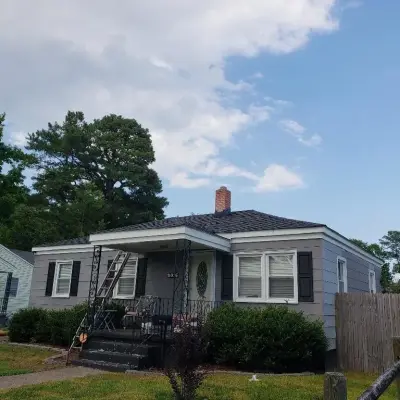 GAF Timberline HD Charcoal Lifetime Architectural Shingles — Roofing & Gutter Services project by WT Anderson Corp.