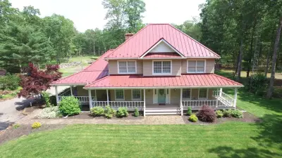 Dymi Construction Inc - Roofing & Gutter Services in Morrisville, PA