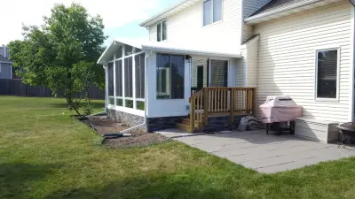 West Des Moines, Iowa Residents Set Up Oasis All Season Sunroom by Midwest Construction & Supply INC