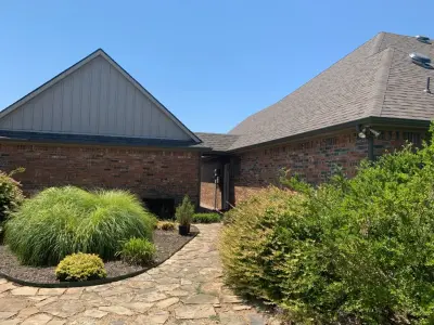 Replacement of outdated clay color system with new Terra bronze gutter by Sharp Seamless Gutter