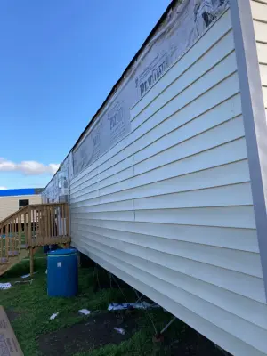 Big Dog Construction LLC - Roofing & Gutter Services in Carthage, MS