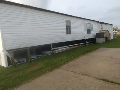 Big Dog Construction LLC - Roofing & Gutter Services in Carthage, MS