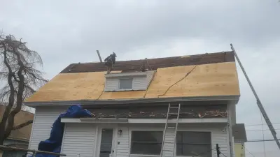Delarosa Roofing - Roofing & Gutter Services in Salem, MA