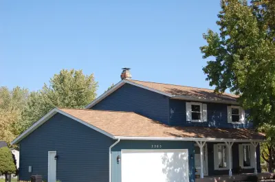 Owens Corning Duration Desert Tan in Valparaiso Indiana — Roofing & Gutter Services project by Bennett Roofing, LLC