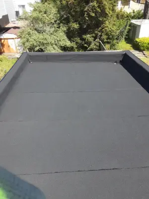 Daly Town — Roofing & Gutter Services project by Moctezuma Roofing Inc.