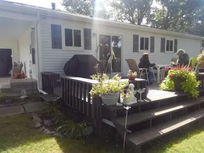 Veranda and new patio — Roofing & Gutter Services project by DK Roofing Solutions