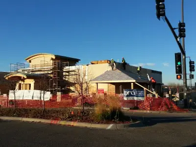 Crimson Stone Barbecue — Roofing & Gutter Services project by NMC Exteriors & Remodeling
