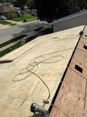 Roof replacement assembly — Roofing & Gutter Services project by AJ Exteriors & Roofing Inc.