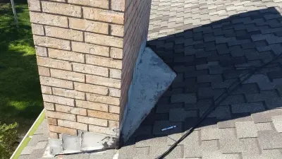 Exterior Cladding and Chimney — Roofing & Gutter Services project by Spangler And Reimers Roofing