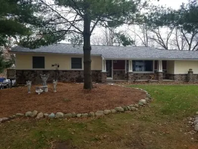 Cladding and Rock — Roofing & Gutter Services project by DK Roofing Solutions