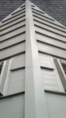 Rooftop Windows and Seamless Roofing — Roofing & Gutter Services project by Precision Roofers, LLC