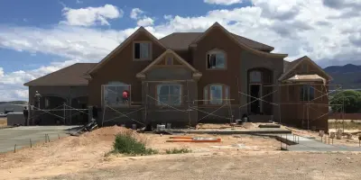 Stucco Showcase Home — Roofing & Gutter Services project by Sideone Exteriors